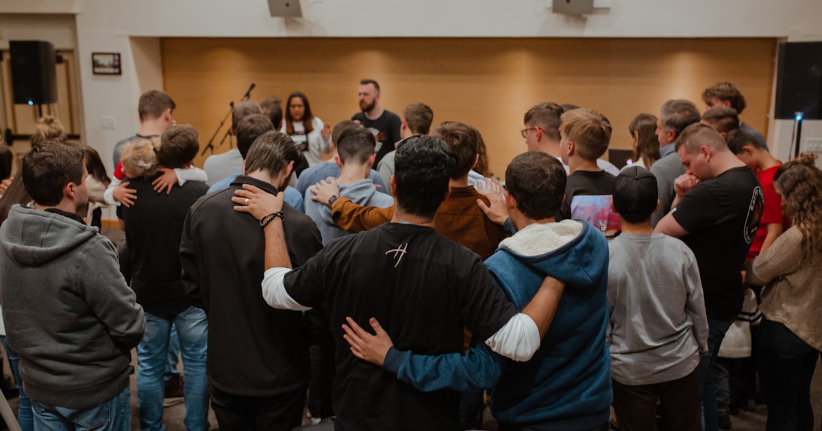 Group of people standing in front of people