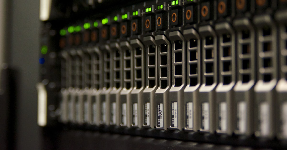 Server rack with blinking green lights