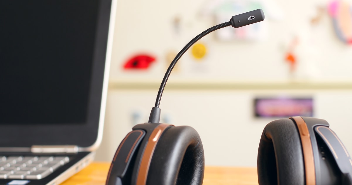 A headset near a laptop