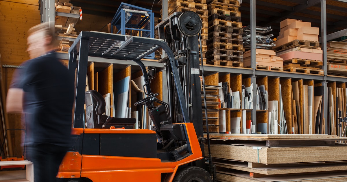 yellow and black fork lift