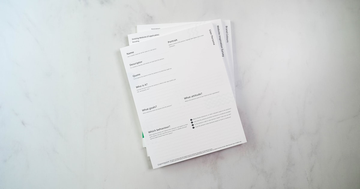 A stack of papers on a counter