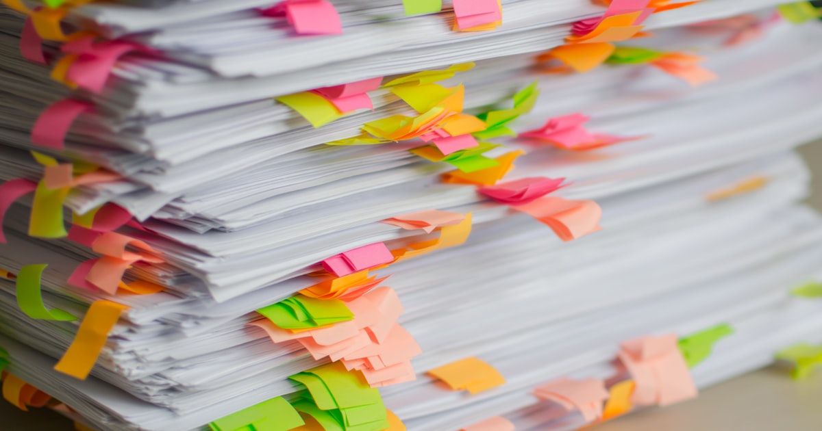 Papers with sticky tabs