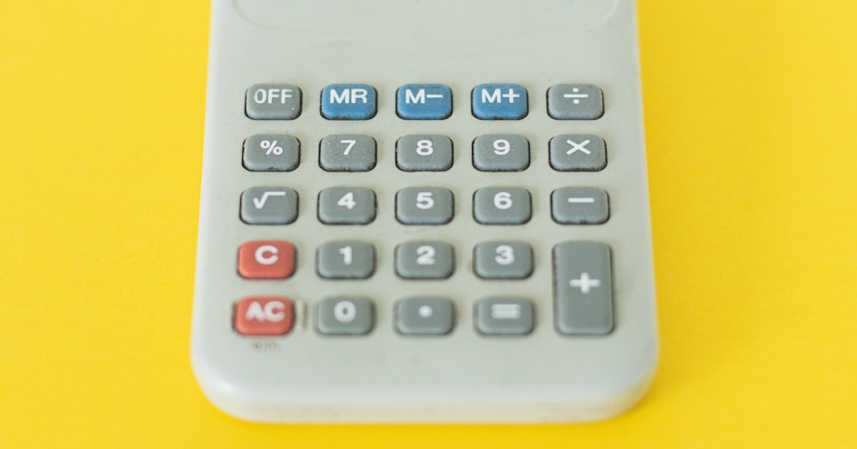 A calculator on yellow