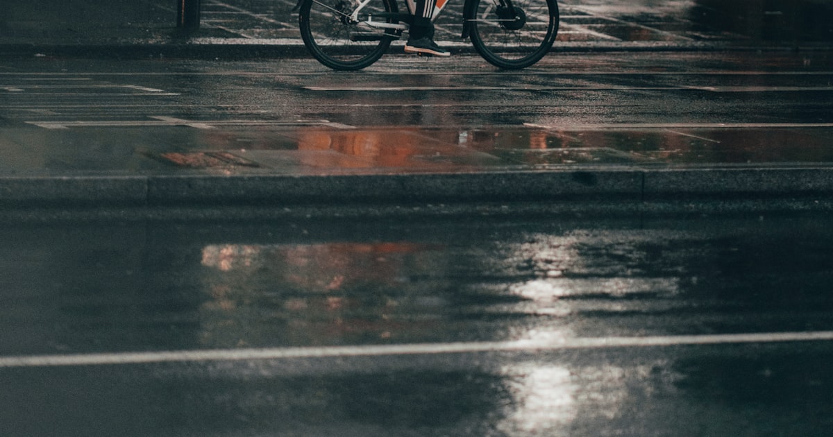A delivery rider at night