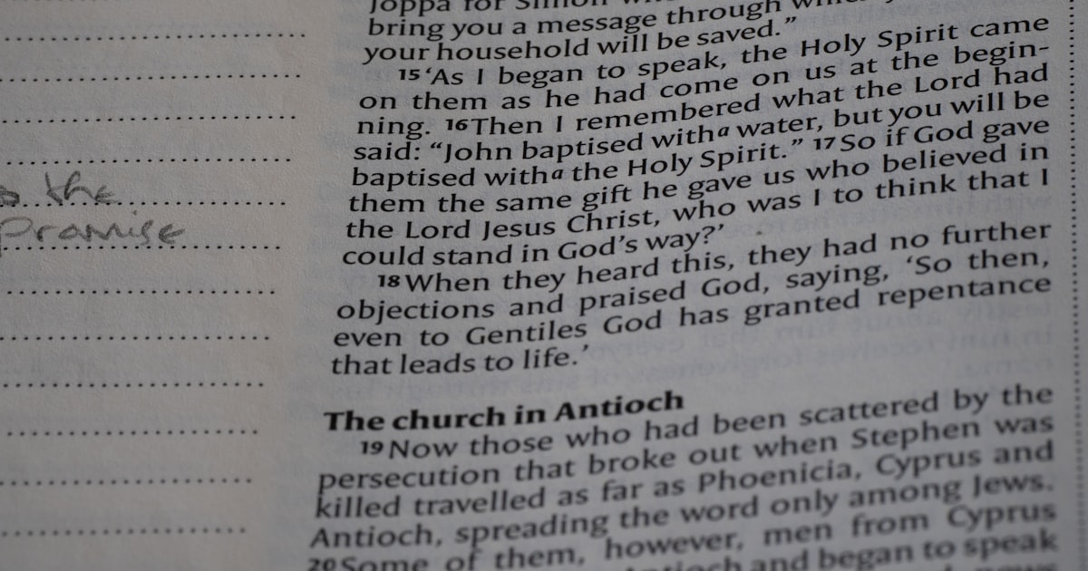 A close up of a book with writing on it
