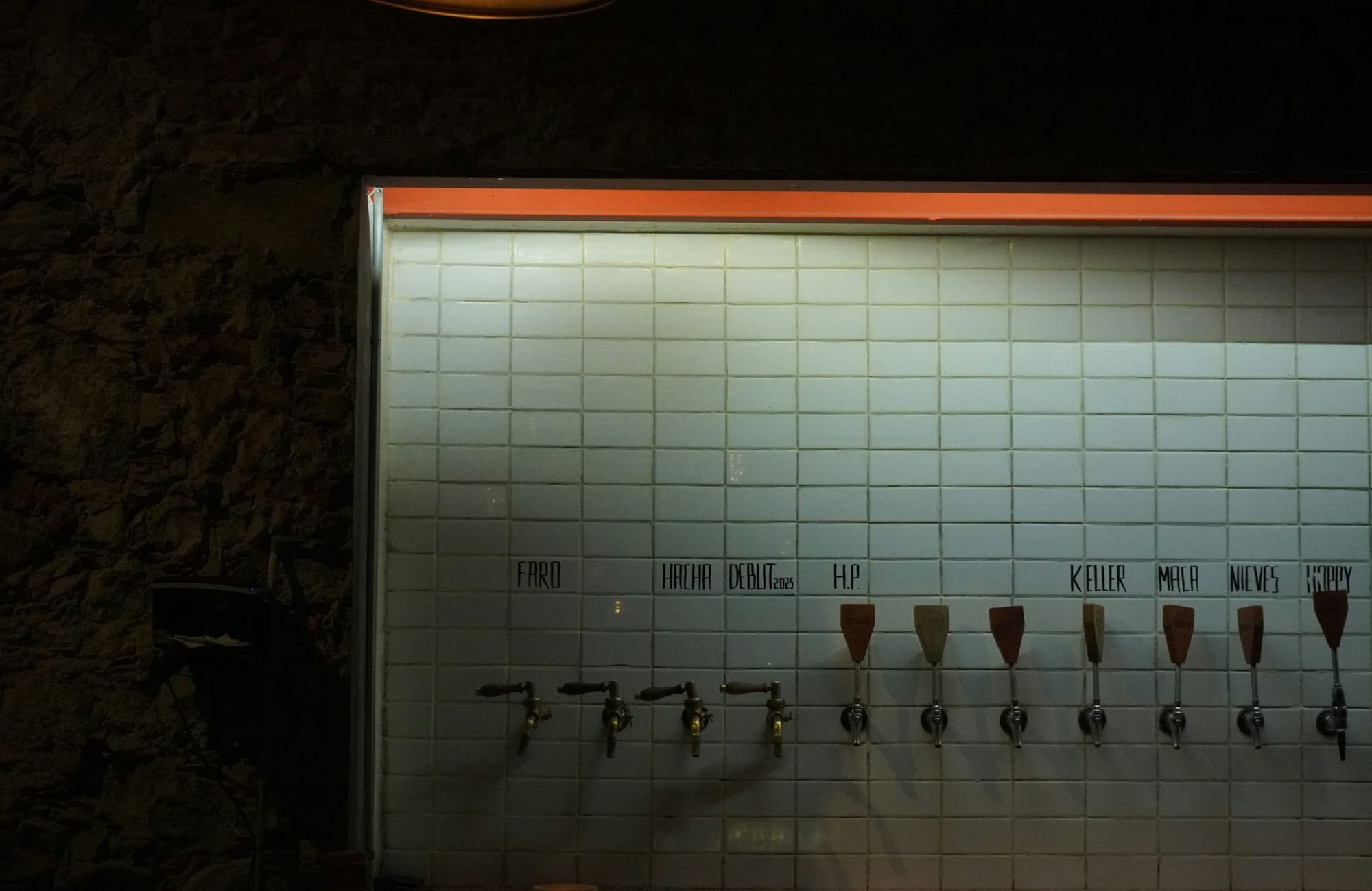 The Iron & Grain taproom tap wall