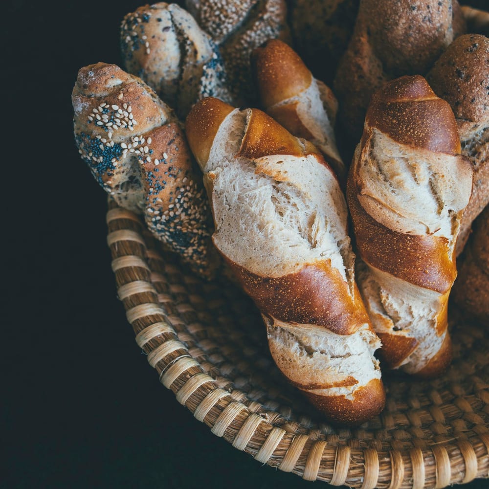 House-made pastry basket: croissant, morning bun, and scone