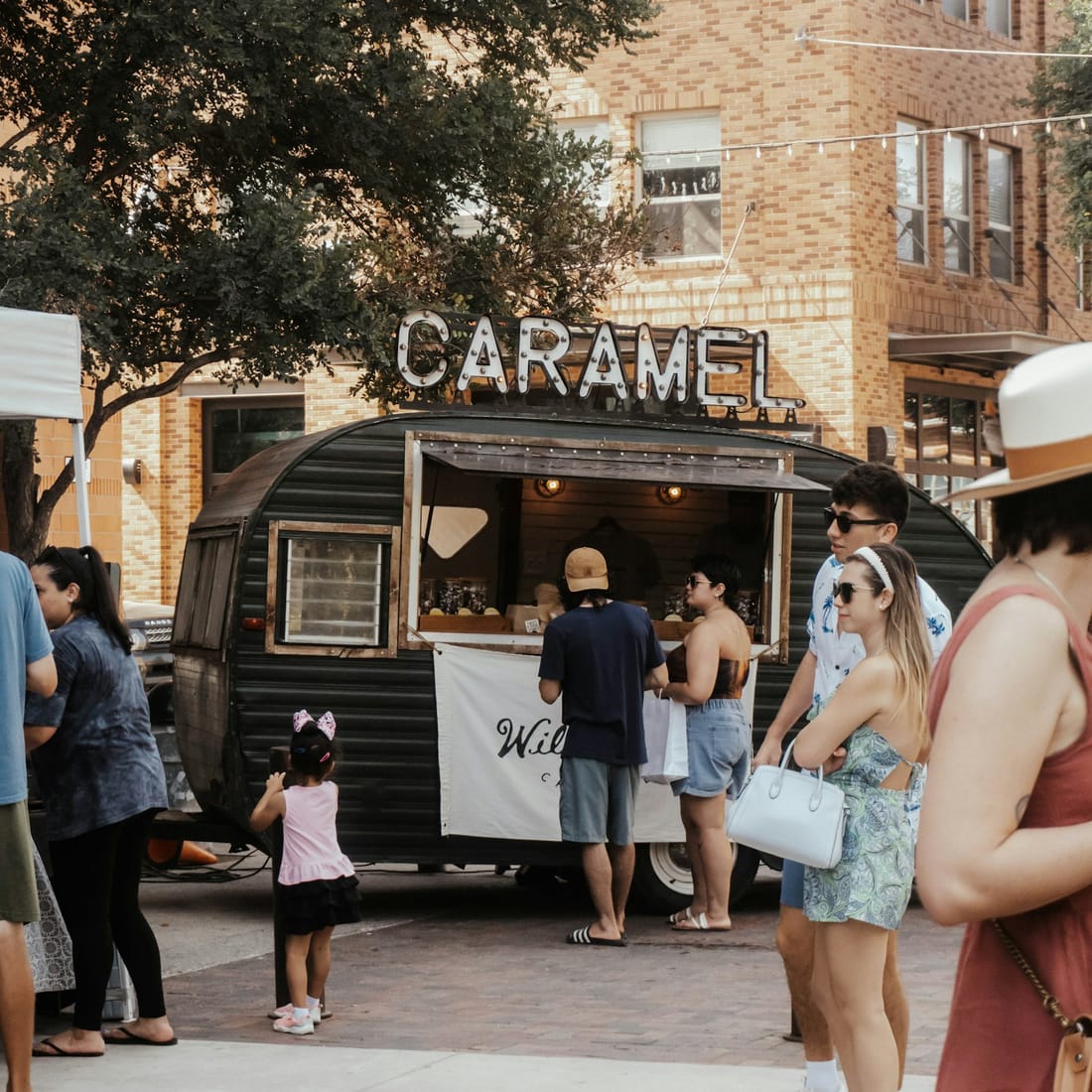Saturday crowd waiting at Mueller Farmers Market