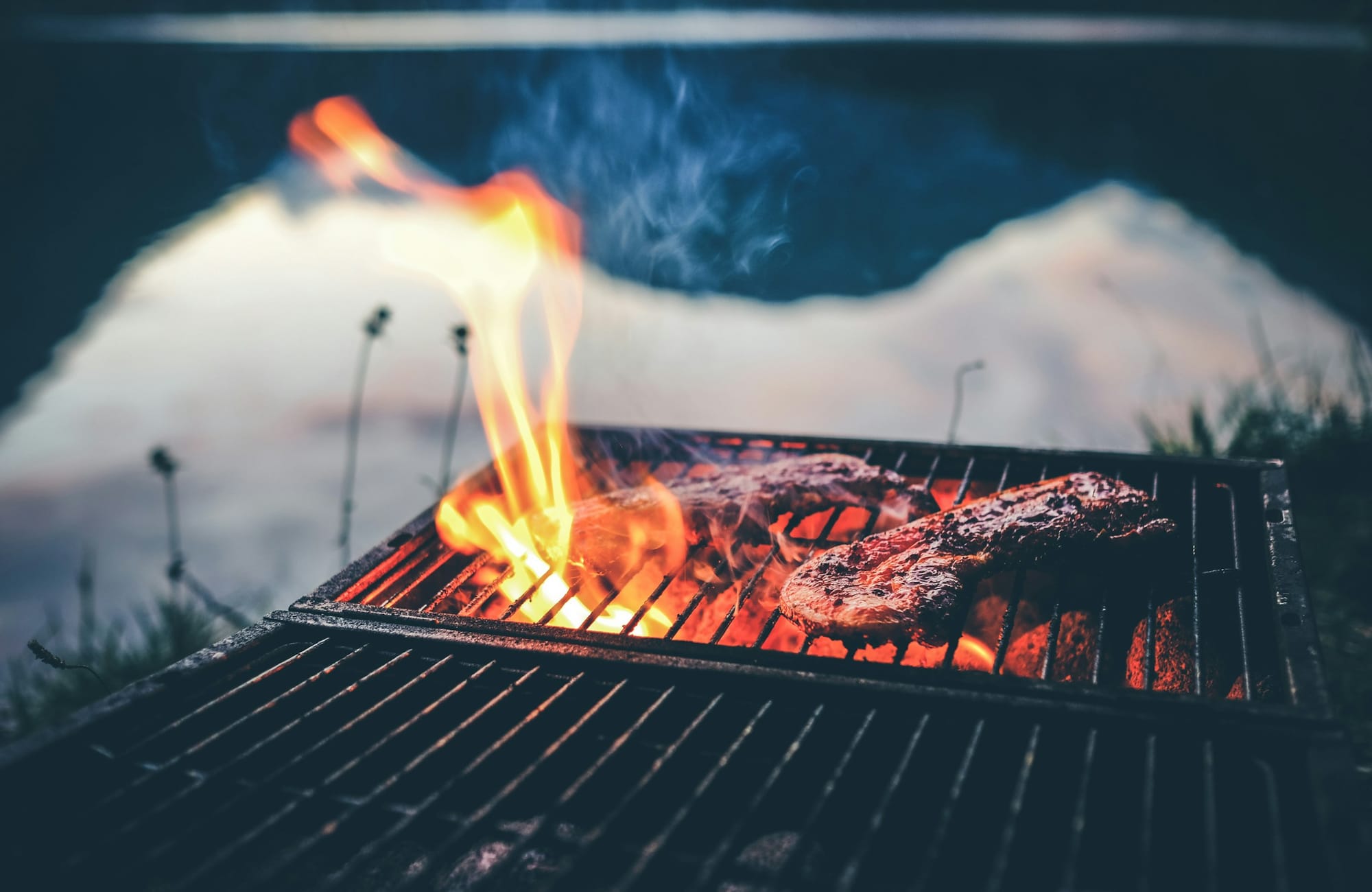 Smoke and fire over the grill