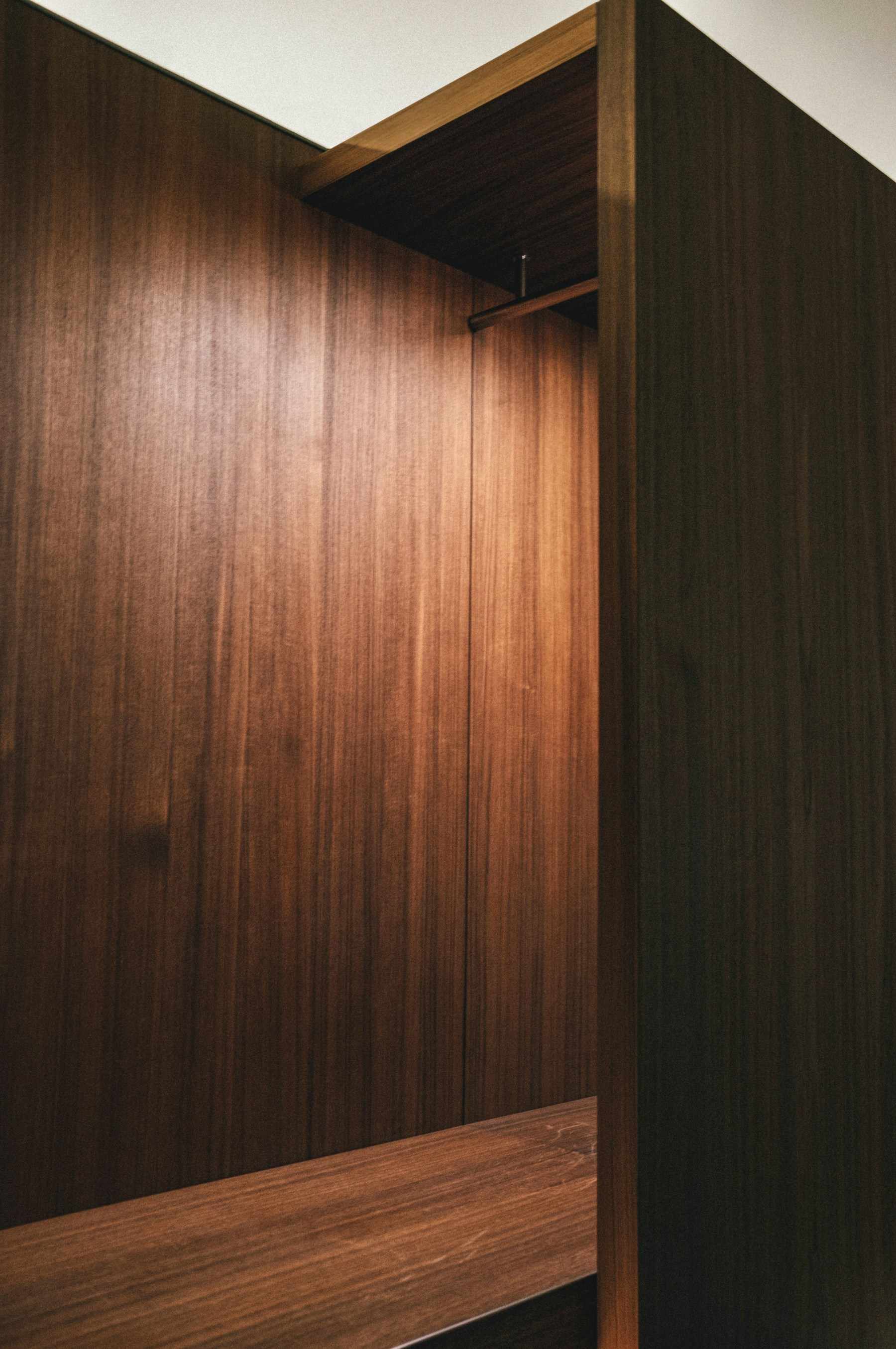 Close detail of the Currituck Sideboard’s book-matched black walnut door face