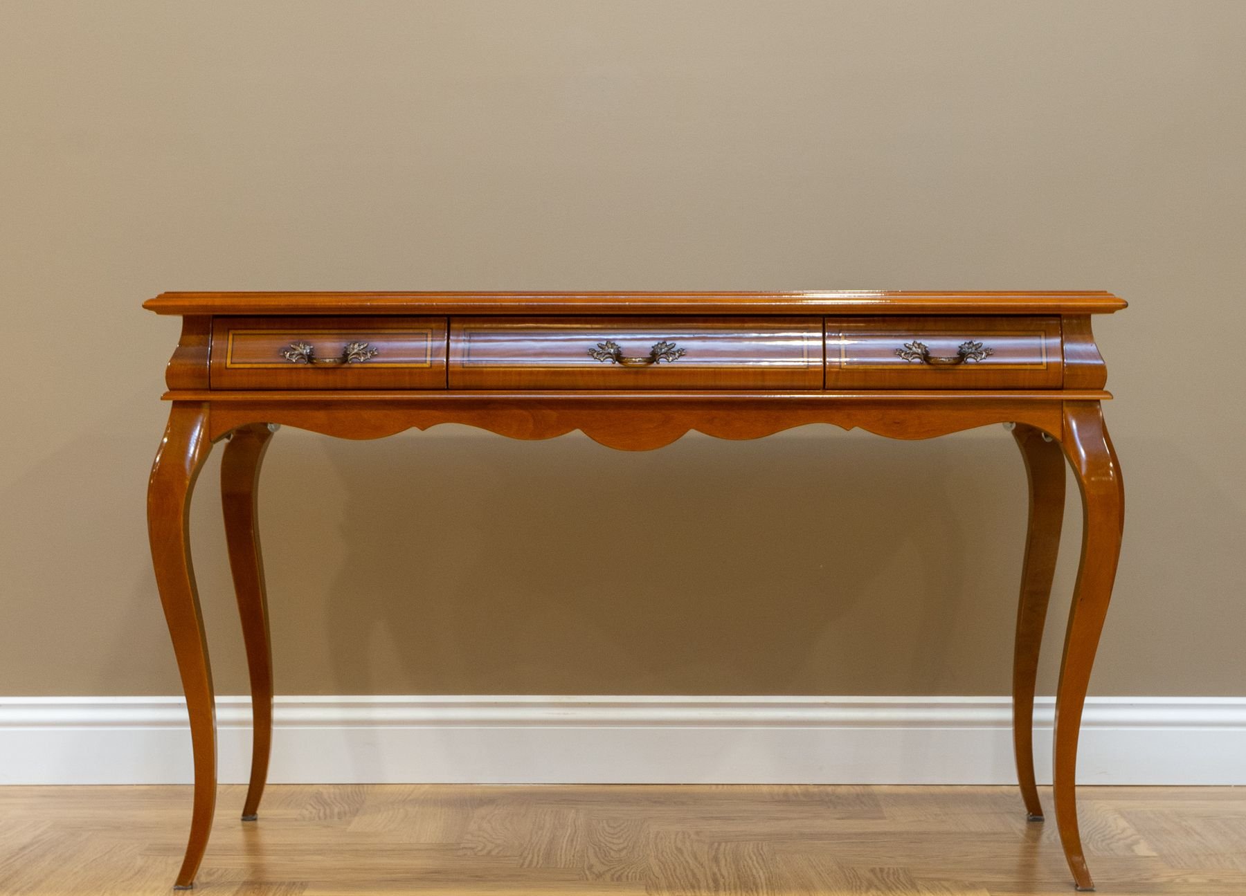 The Watauga Console Table, a slender wood console on turned legs