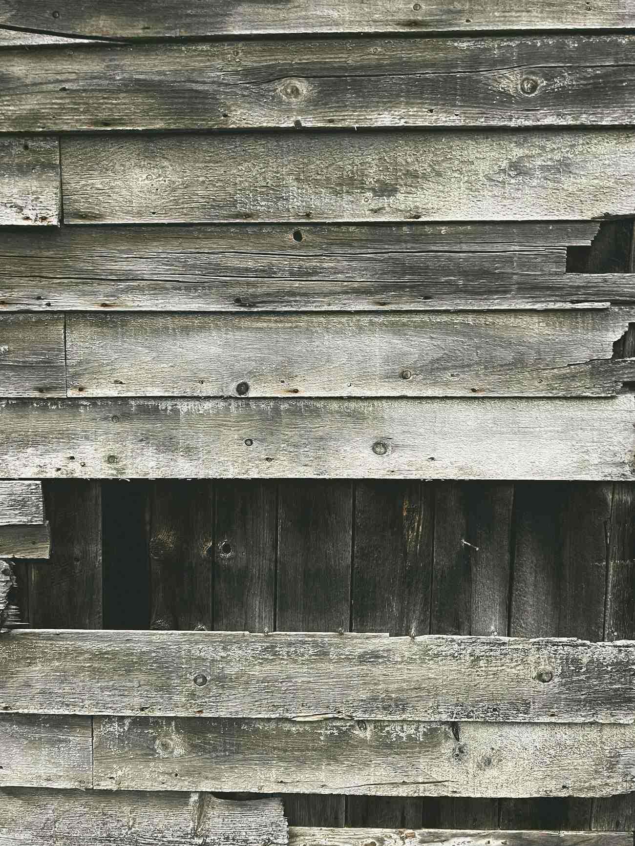 Close-up texture of weathered rough-sawn board stock