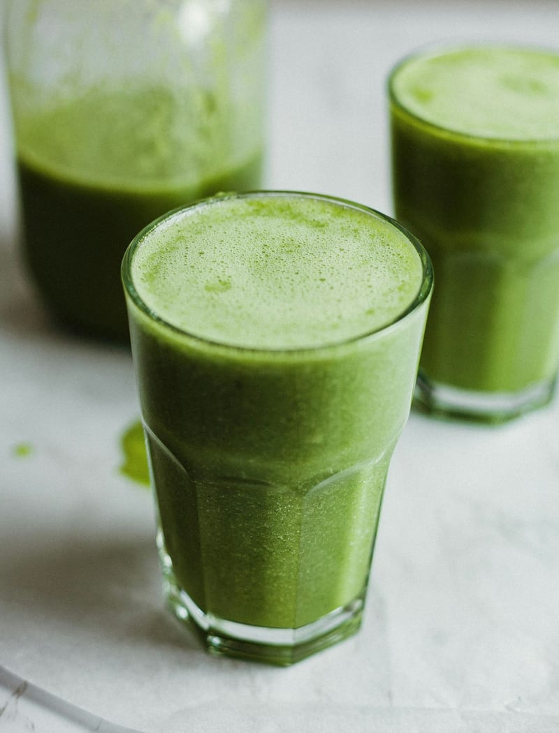 A glass of vibrant cold-pressed green juice