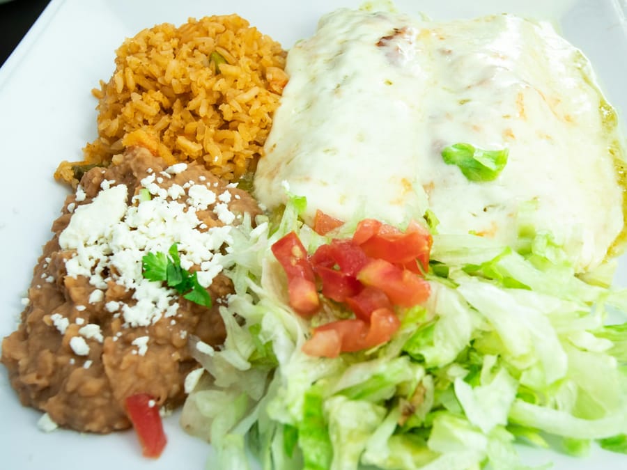 Tlayuda Oaxaqueña — Crisp tortilla with black beans, quesillo & tasajo