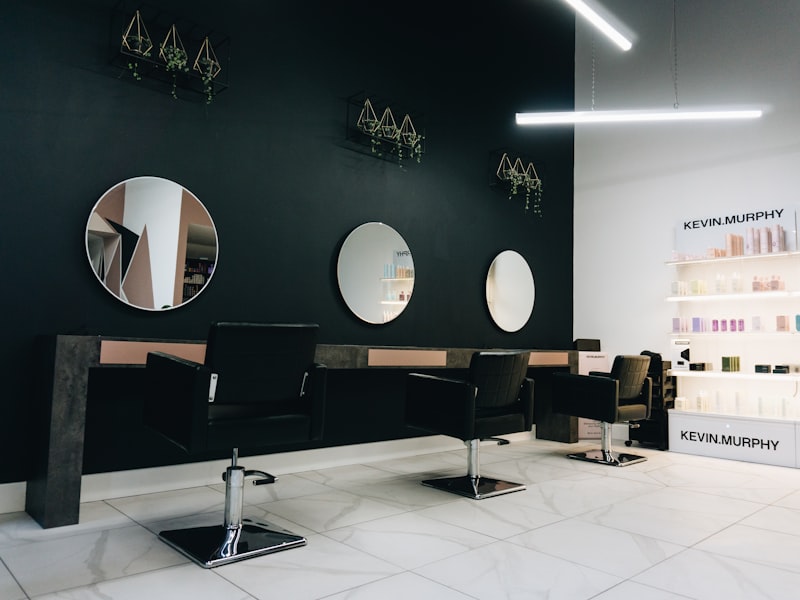 Void & Vein Tattoo studio interior — clean, bright workspace with art on walls