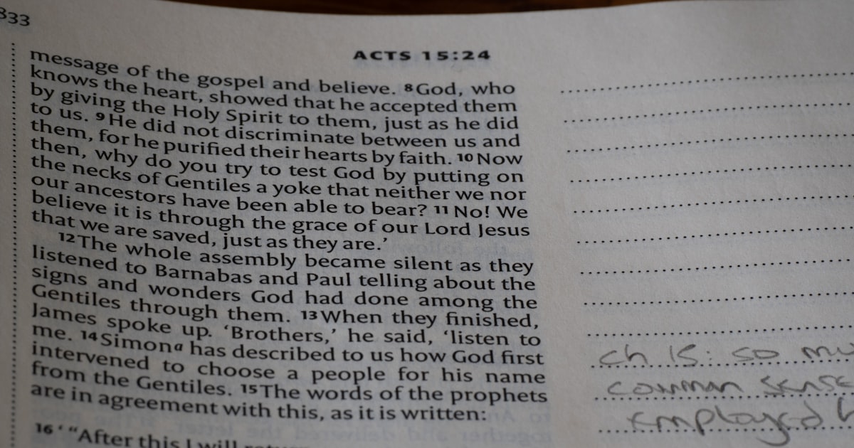A close up of a book with writing on it