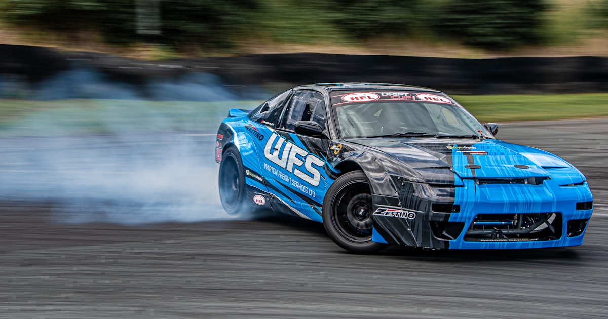 A blue race car on a track