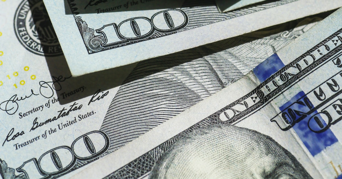 Stacked hundred dollar bills