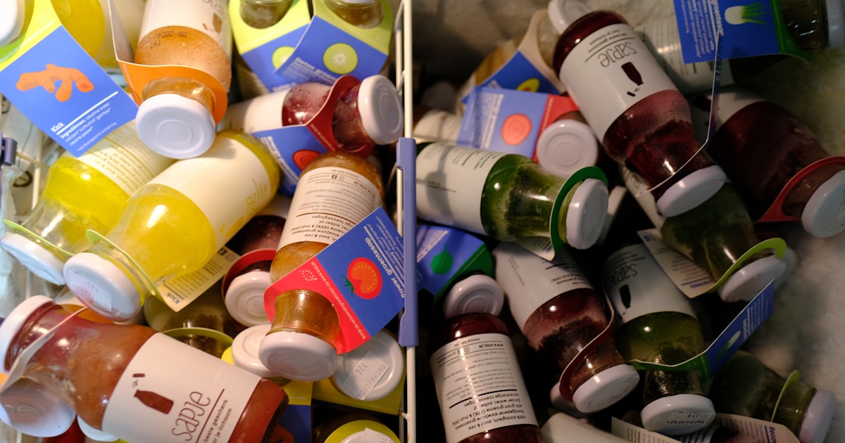 A pile of baby bottles sitting next to each other