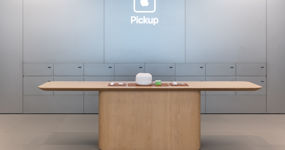 A table with a phone on it in a room